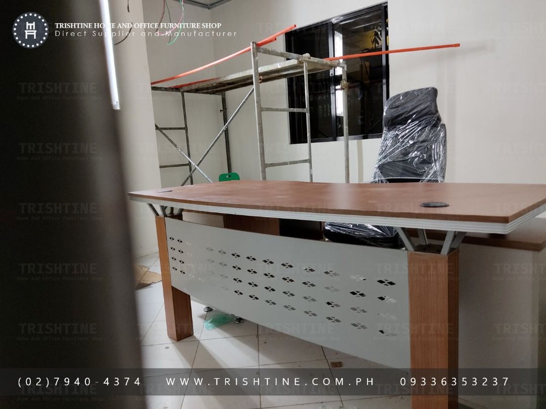 Executive Office Desk with Metal Accents L-Shape Type (Category: Office Furniture & Fixtures) located in Caloocan City. Submitted by trishtine_jim9 (Listing ID 1433473310, Image 1). Description: - Stylish executive office desk - Light wood-grain finish - Spacious work surface - Unique design with metal accents - Sturdy and well-constructed - Suitable for professional office DISCLAIMER: Price is for Posting Purposes Only.