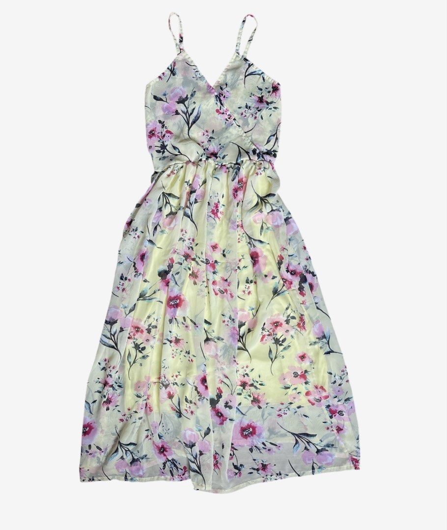 Floral Print Spaghetti Strap Dress (Category: Dresses) located in Manila. Submitted by _theselection.ph (Listing ID 1433527815, Image 1). Description: Floral sundress in light yellow with pink and purple accents. Features a V-neck, spaghetti straps, elastic waist, and flowing skirt. Lightweight, sheer fabric..