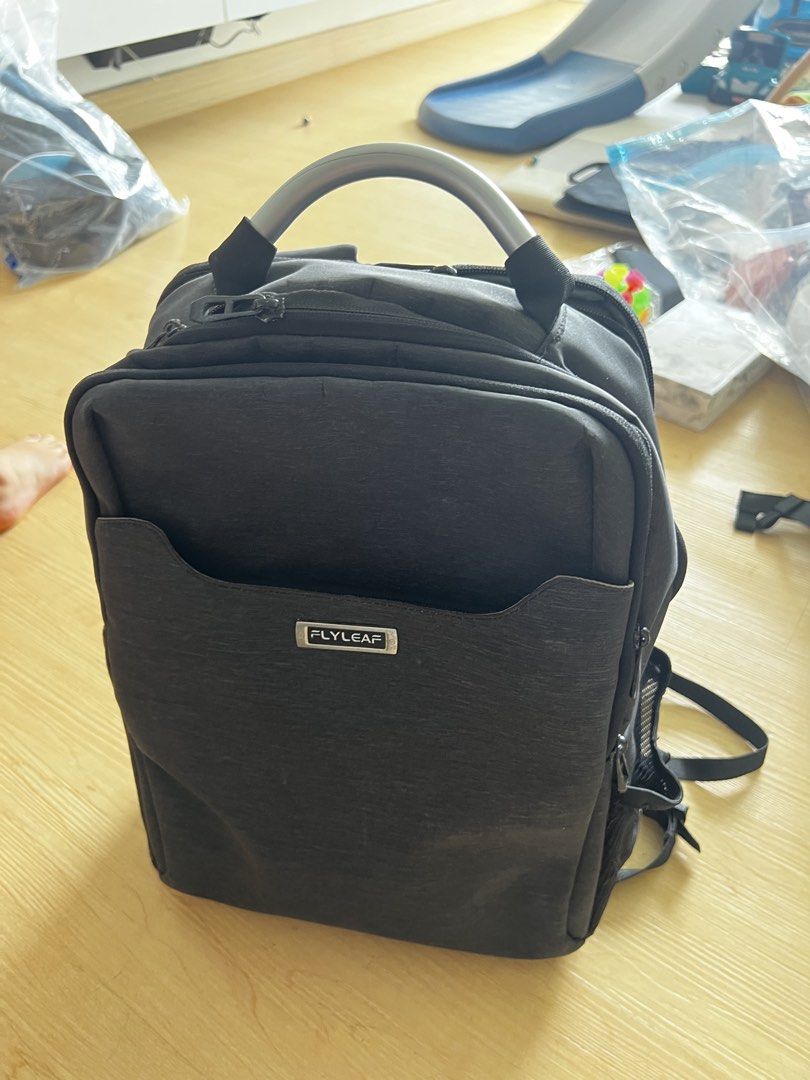 Flyleaf Camera Backpack (Category: Backpacks) located in Kuala Lumpur. Submitted by teoh_88 (Listing ID 1433419327, Image 1). Description: - Designed for photographers - Multiple compartments for camera gear - Padded laptop section - Dedicated spaces for lenses and accessories - Comfortable carrying with top handle and adjustable shoulder straps - Side pocket - USB charging port - Durable dark grey material Interested please contact 0——1—6—5—9—8–