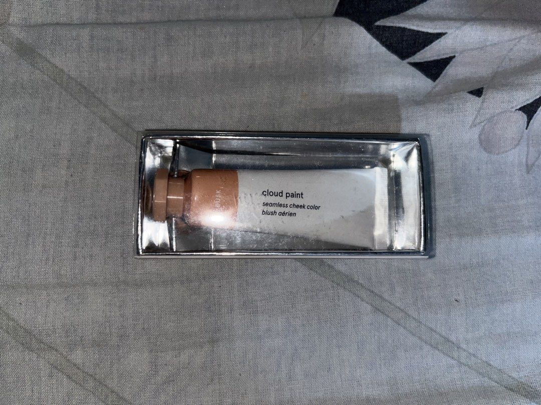 Glossier Cloud Paint Blush in the shade Dusk (Category: Makeup) located in Quezon City. Submitted by ayzria (Listing ID 1433523081, Image 1). Description: Glossier Cloud Paint in shade “Dusk” • Authentic, originally purchased via Carousell (seller bought it from a Glossier pop-up in Miami) • Shade: Dusk (natural warm nude) • Condition: 98% full • Only lightly swatched, never fully used • No issues with packaging or product quality Reason for sell