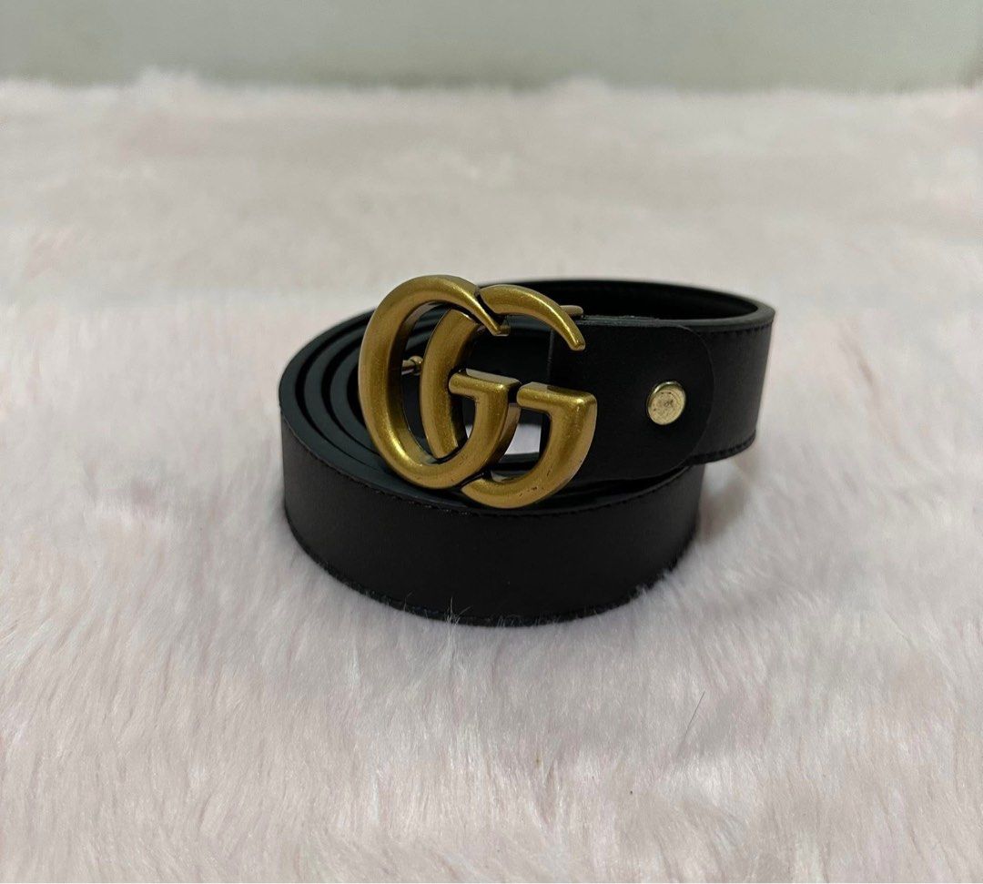 Gucci GG Belt Black Leather (negotiable) (Category: Belts) located in Quezon City. Submitted by sherashley (Listing ID 1433559071, Image 1). Description: Gucci belt with a black genuine leather strap and a gold-tone GG buckle. "Made in Italy" size is 110-44. A classic accessory that adds a touch of luxury to any outfit. NOTE: bought this fr a live seller at a thrift store in Japan. The seller stated that it is authentic, but i am selling it as is
