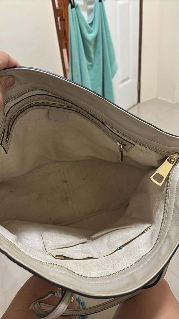Gucci Guccissima Tote Bag (Category: Luxury Bags & Wallets) located in Quezon City. Submitted by janellelunasin01 (Listing ID 1433546949, Image 3). Description: - Authentic Gucci tote bag - Beige color with Guccissima pattern - Features multiple compartments and zipper closure - Includes dust bag - Double handles and spacious interior - Serial number visible in photos - Made in Italy.