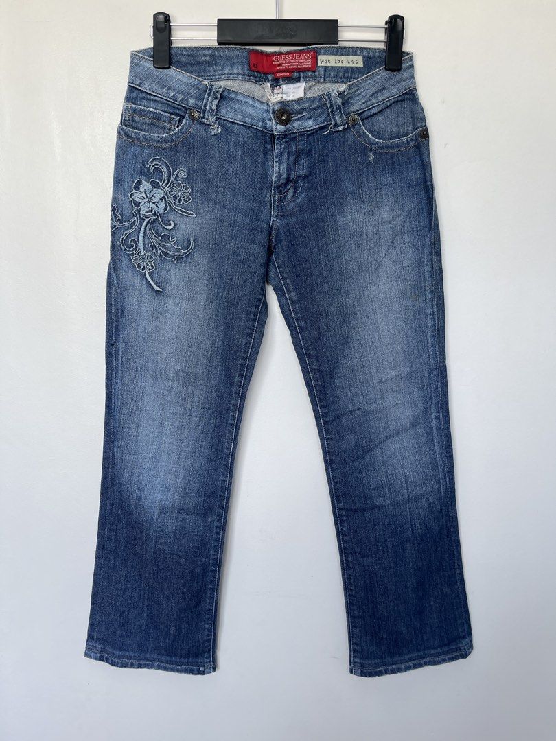Guess Embroidered Jeans (Category: Jeans) located in Iligan City. Submitted by nick.segualan (Listing ID 1433535482, Image 3). Description: - Guess Jeans denim jeans - Embroidered floral design on back pockets - Classic five-pocket design - Button closure with Guess logo - Size: W28 L36 - Made from stretch denim - Comfortable fit - Perfect for everyday wear.