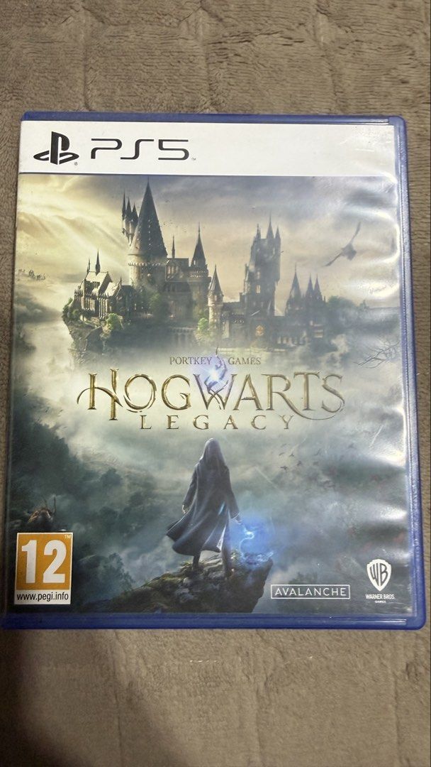 Hogwarts Legacy PS5 Game (Category: PlayStation) located in Manila. Submitted by jacetnlc (Listing ID 1433561348, Image 1). Description: - Hogwarts Legacy for PlayStation 5 - Open-world role-playing game - Set in the Harry Potter world - Includes game disc and case - Includes voucher code for extra content - Rated 12 - Compatible with PlayStation 5 consoles.