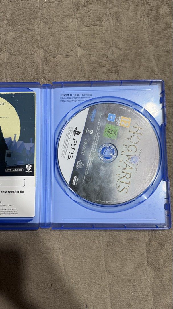 Hogwarts Legacy PS5 Game (Category: PlayStation) located in Manila. Submitted by jacetnlc (Listing ID 1433561348, Image 3). Description: - Hogwarts Legacy for PlayStation 5 - Open-world role-playing game - Set in the Harry Potter world - Includes game disc and case - Includes voucher code for extra content - Rated 12 - Compatible with PlayStation 5 consoles.