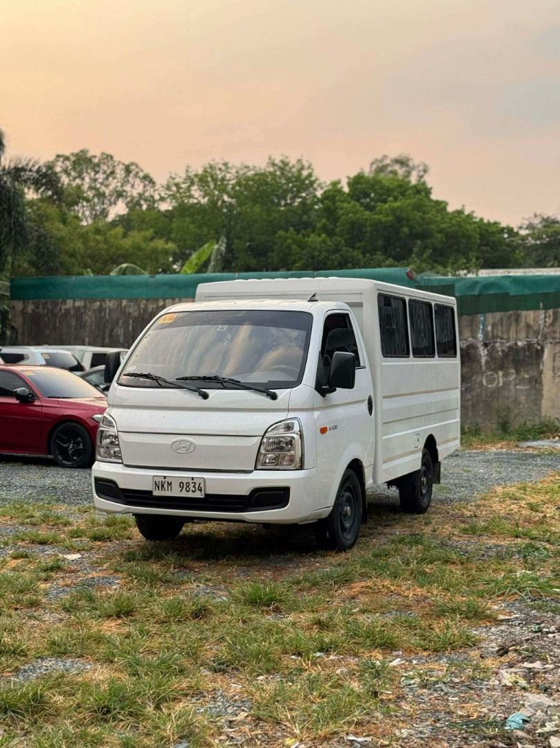 Hyundai H100 Shuttle Body Dual AC (Category: Looking For) located in Kawit. Submitted by markuzmathers (Listing ID 1433568617, Image 3). Description: Hyundai H100 Shuttle Body Dual AC 2025 acquired - White 17k+ mileage ( Casa Maintained ) Price: ₱795,000 - LOWEST IN THE MARKET - SRP BRANDNEW PRICE @1,365,000 - Mags casa marking still intact - Interior and Exterior can be pass as brandnew - No hidden issues, Gas and go. Guaranteed best buy and LOW