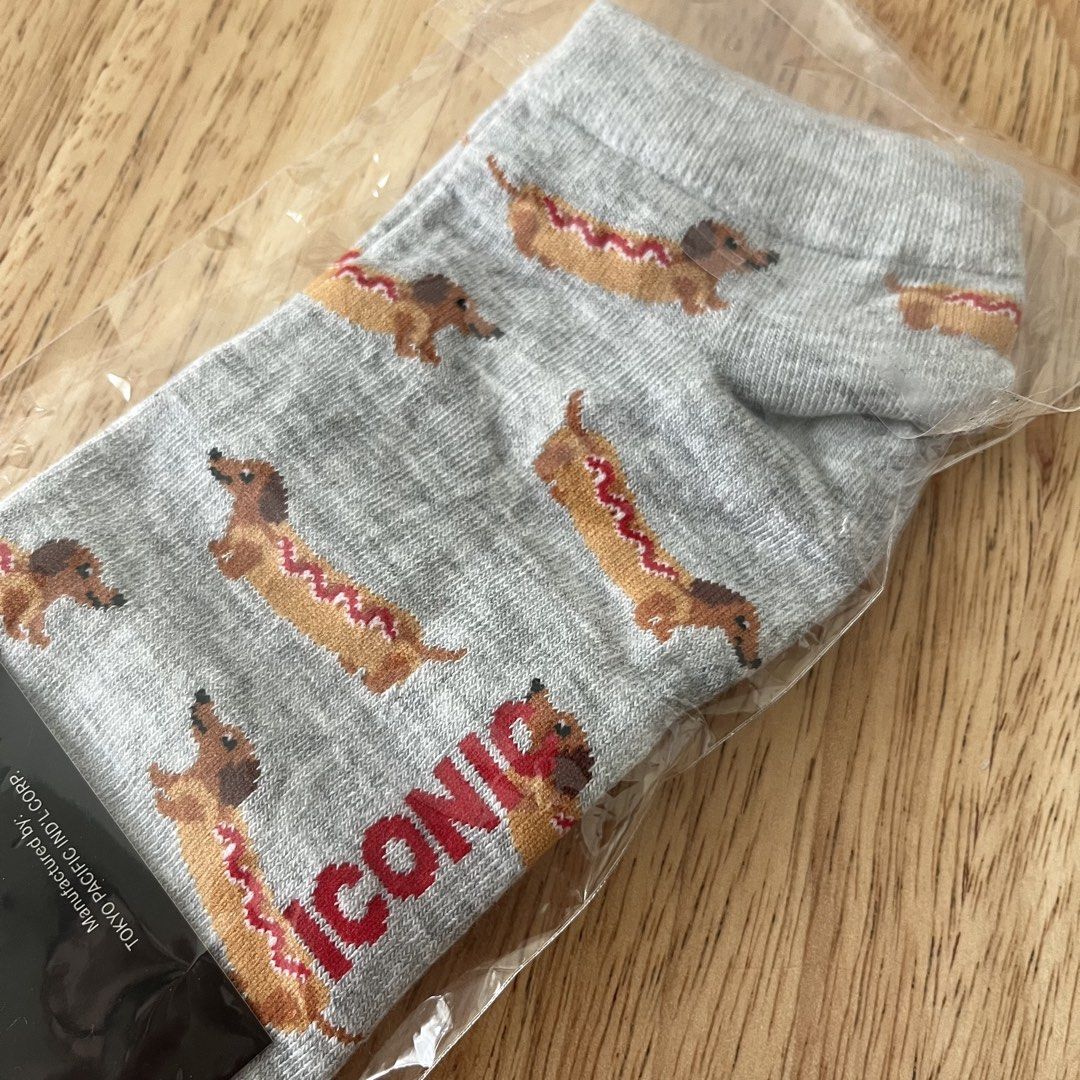 Iconic Socks Hotdog Dog Light Grey Crew Socks (Category: Socks) located in Makati City. Submitted by happycloset5 (Listing ID 1433413503, Image 2). Description: - New Iconic socks - Features a fun hotdog pattern - Light grey background - Crew length - Suitable for office or formal wear - Comes in original packaging - Adds personality to your outfit.