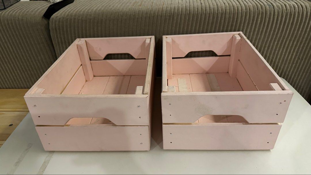 IKEA Pink Wooden Storage Crates (Category: Storage Boxes & Baskets) located in Manila. Submitted by pinklilo (Listing ID 1433503437, Image 1). Description: - Set of two pink wooden storage crates - Made of wood - Features cut-out handles - From IKEA - Ideal for storage.