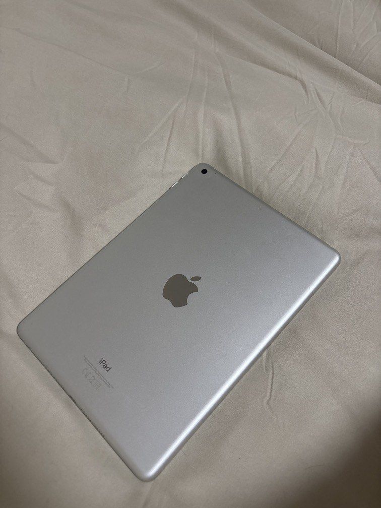iPad 6th Gen (Category: iPad) located in Quezon City. Submitted by alleyglvn (Listing ID 1433536611, Image 3). Description: -Original, well used -Wi-Fi 128GB Silver -Free black case; current screen protector is matte -Box is intact, but dirty -No physical damages or dents -All buttons and touch ID working -Original LCD Issues: -Battery replaced once last year, Sept 2025 in GH -No Charger included -Not Original battery and slow response rate RFS: 