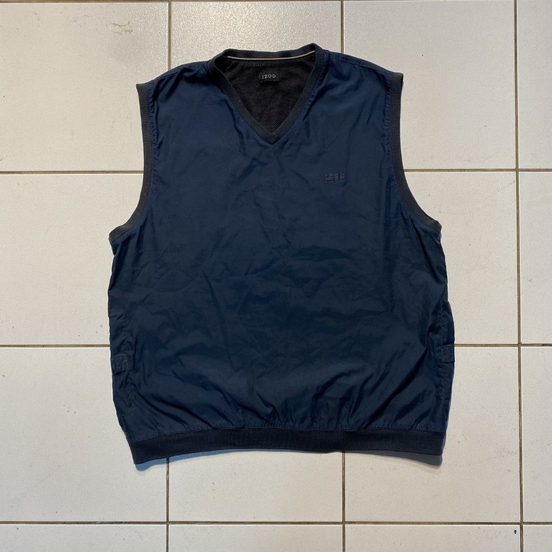 IZOD Navy Blue Vest (Category: Vests) located in San Jose del Monte. Submitted by aidealthrift (Listing ID 1433467580, Image 1). Description: - IZOD navy blue vest - V-neck design - Two side pockets with velcro closures - IZOD logo on chest - Mesh interior.