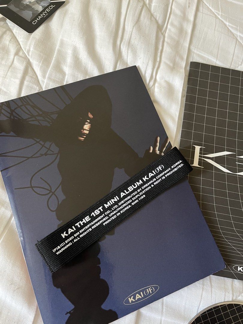 KAI (EXO) - KAI The 1st Mini Album (Category: K-Wave Merchandise) located in Manila. Submitted by marsmoving (Listing ID 1433515538, Image 2). Description: - KAI's first mini album - Includes: Album, CD, Mini Poster set, Stickers and Wristband - Photocard images: Artistic - Wristband: Features the album title.
