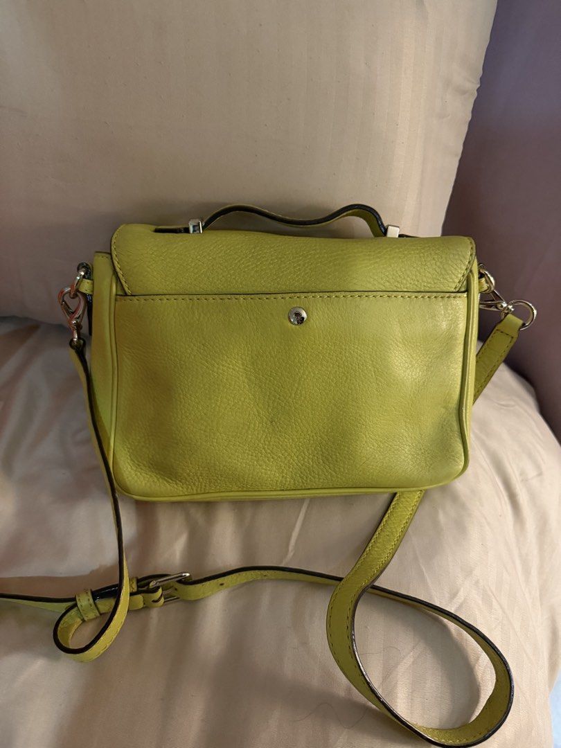 Kate Spade Crossbody Messenger Bag (Category: Cross-body Bags) located in Pasay City. Submitted by prettystudio (Listing ID 1433533650, Image 3). Description: Bought in US outlet Barely noticeable signs of usage on the back.