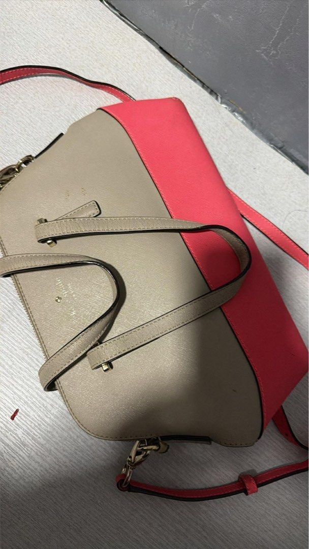 Kate Spade Two-Tone Handbag (Category: Luxury Bags & Wallets) located in Manila. Submitted by kaths88 (Listing ID 1433531546, Image 3). Description: - Kate Spade handbag - Two-tone design: beige and pink - Zip closure - Gold-tone hardware - Includes shoulder strap - Visible wear on straps.