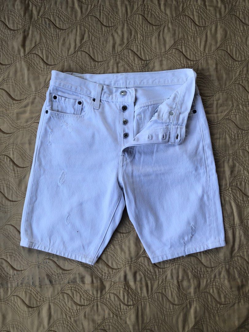 Levi's 501 White Denim Shorts (Category: Shorts) located in Sipalay. Submitted by lptulak (Listing ID 1433540027, Image 1). Description: - White Levi's 501 denim shorts - Button fly - Classic five-pocket design - Features the Levi's red tab - Distressed details for a vintage look - Genuine Levi's leather patch - Multiple internal tags for authenticity.