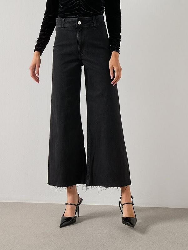 Mango Catherine Culotte High Rise Jeans - Black (Category: Jeans) located in Paranaque City. Submitted by lovedbyblanche (Listing ID 1433557452, Image 1). Description: - Mango wide-leg denim jeans - Classic black wash - Raw hem - High-waisted - Button closure - Size 32.
