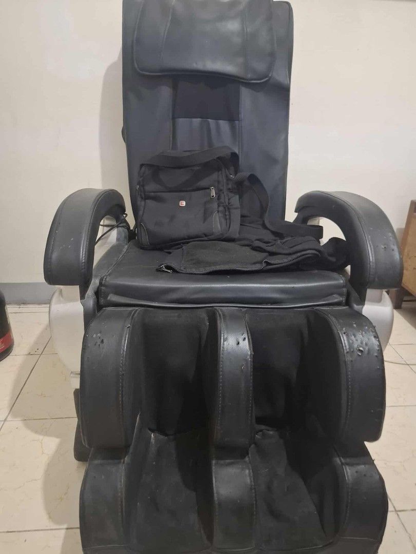Massage Chair (Category: Massage Devices) located in Quezon City. Submitted by aicat0923 (Listing ID 1433409239, Image 1). Description: -Black Massage Chair -Integrated Foot Rest for added comfort -Offers Multiple massage function -designed fot relaxation and stress relief -Price Negotiable Issue -Scratches on Foot Rest.