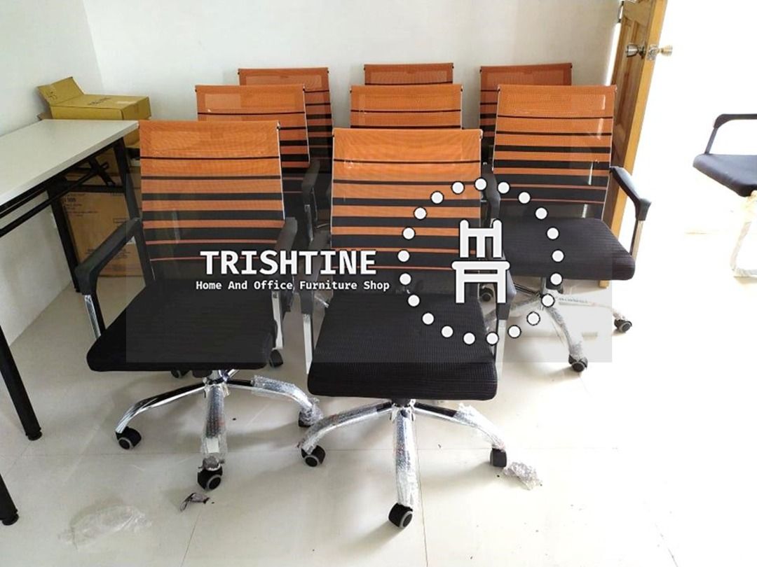 Mesh Office Chair Black/Orange (Category: Office Furniture & Fixtures) located in Caloocan City. Submitted by trishtine_jim9 (Listing ID 1433426574, Image 2). Description: - Black/Orange mesh back and seat - Chrome base with wheels - Includes armrests - Ideal for home or office Disclaimer: Price indicated is for posting purposes only.