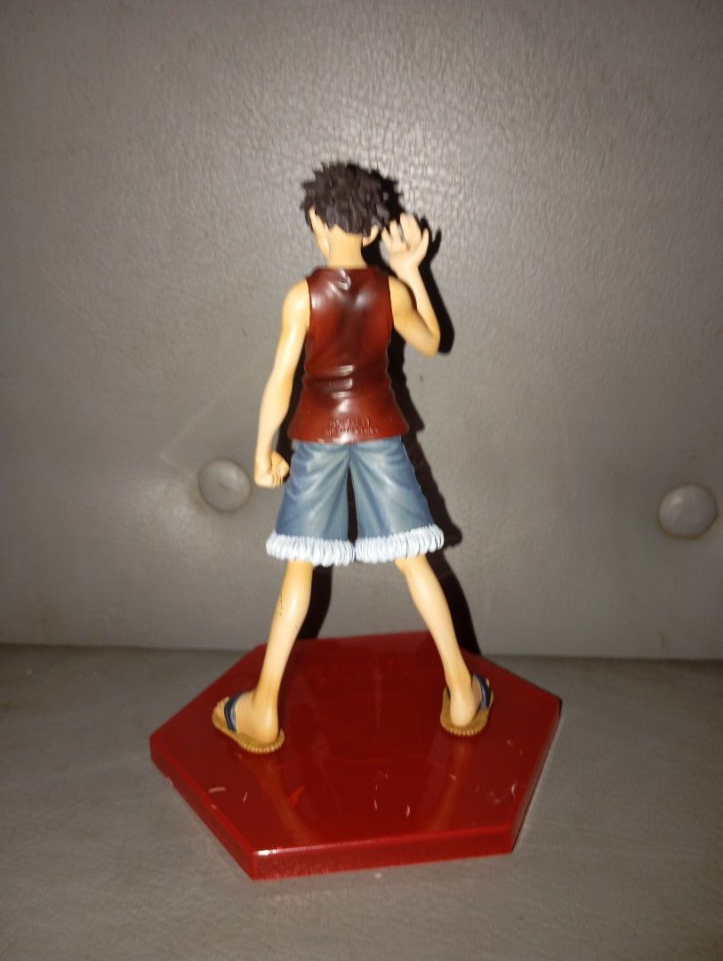 Monkey D Luffy DX Figure Banpresto One Piece (Category: Figurines & Statues) located in Silang. Submitted by samflores2k4t7 (Listing ID 1433420167, Image 3). Description: for sale Monkey D Luffy One Piece DX Those Who Are Given The Name of D Figure Banpresto 6 inches height issue missing hat and sctatches.