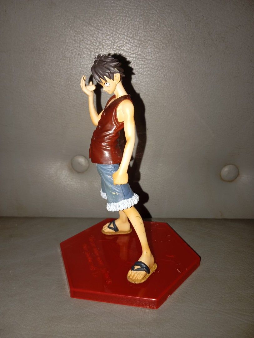 Monkey D Luffy DX Figure Banpresto One Piece (Category: Figurines & Statues) located in Silang. Submitted by samflores2k4t7 (Listing ID 1433420167, Image 2). Description: for sale Monkey D Luffy One Piece DX Those Who Are Given The Name of D Figure Banpresto 6 inches height issue missing hat and sctatches.