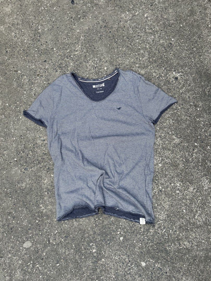MustanG T-shirt (Category: Blouses) located in San Carlos. Submitted by declutterph2420 (Listing ID 1433507369, Image 1). Description: 18x27.
