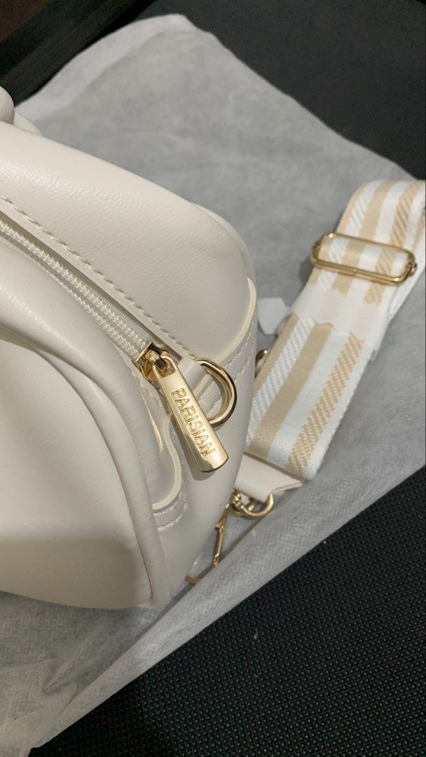 Parisian White Cross Body Bag (Category: Cross-body Bags) located in Batangas. Submitted by lifewithxhan.ph (Listing ID 1433484207, Image 2). Description: - Brand new - Removable strap - Color White .