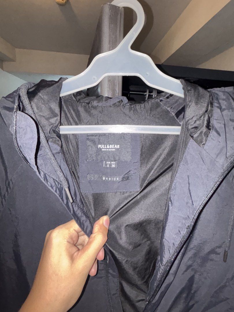 Pull&Bear Basic Jacket (Category: Coats, Jackets and Outerwear) located in Quezon. Submitted by darwin_25 (Listing ID 1433528119, Image 2). Description: - Pull&Bear black jacket - Size: S/36 - Features: Zip-up front, hood, small chest logo - Material: Lightweight - Ideal for layering - Perfect for casual wear.