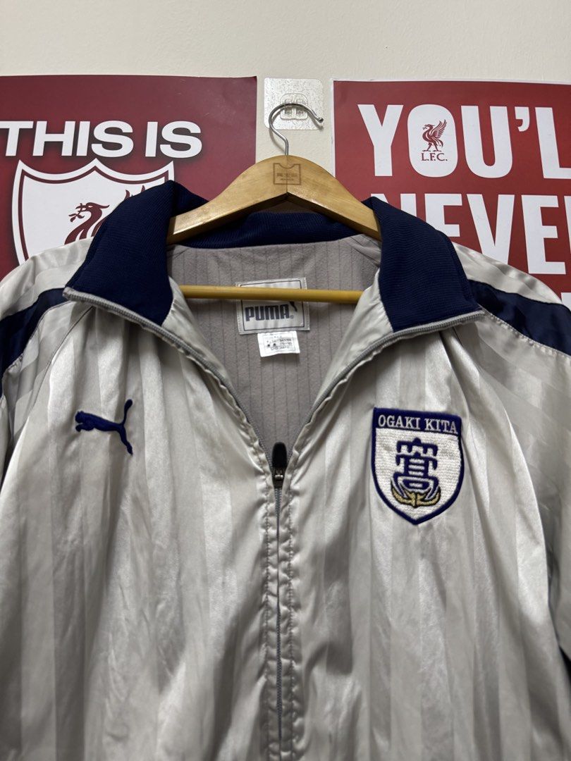 Puma Buffer Track Jacket (Category: Coats, Jackets and Outerwear) located in Sungai Buloh. Submitted by goodinsthrift (Listing ID 1433566493, Image 2). Description: Condition as pictured 8/10 Defects: Pulls at the backside with minor stains Measurements: 23 x 28 inches 🤌🏻.