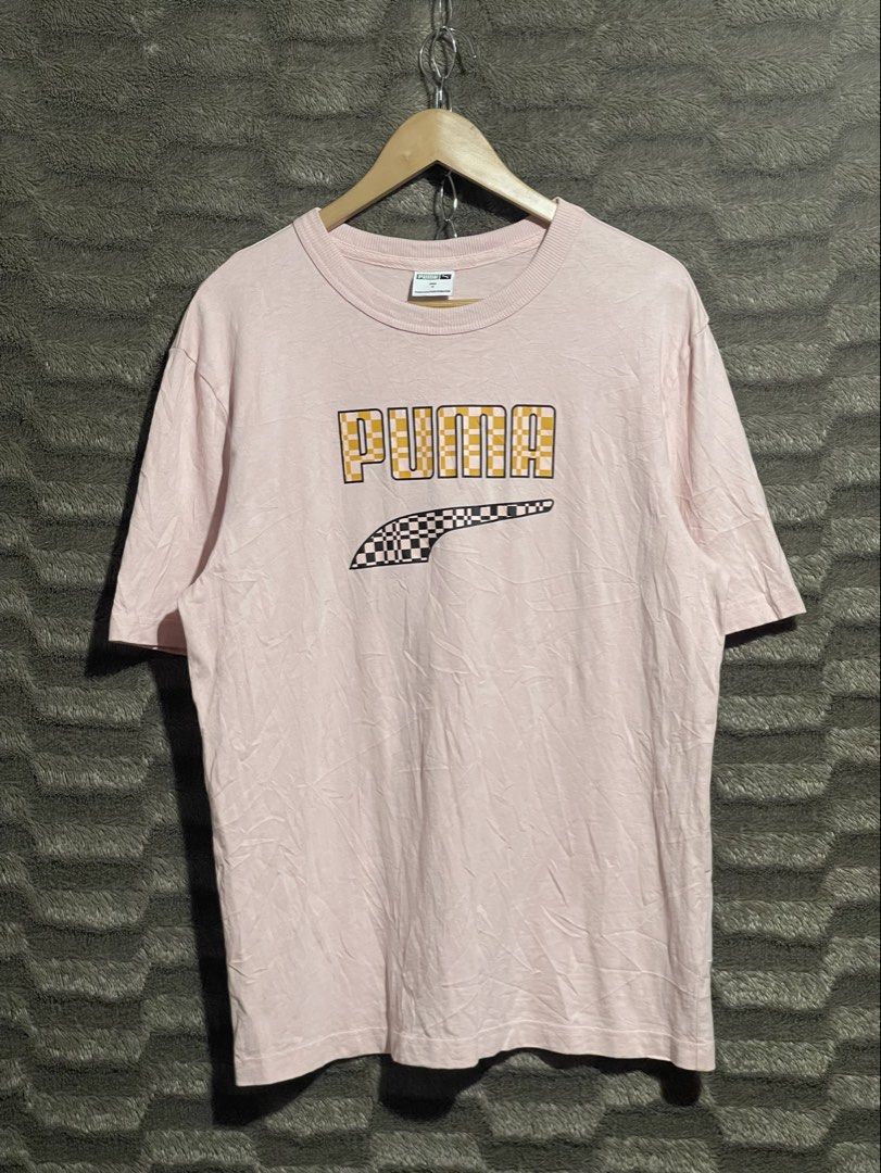 Puma Funny Logo Pink T-shirt (Category: Tshirts & Polo Shirts ) located in Bulacan. Submitted by OG_Domsthrift (Listing ID 1431090230, Image 1). Description: Puma shirt Medium on tag 21x28 No issue Color rate:9.8/10.