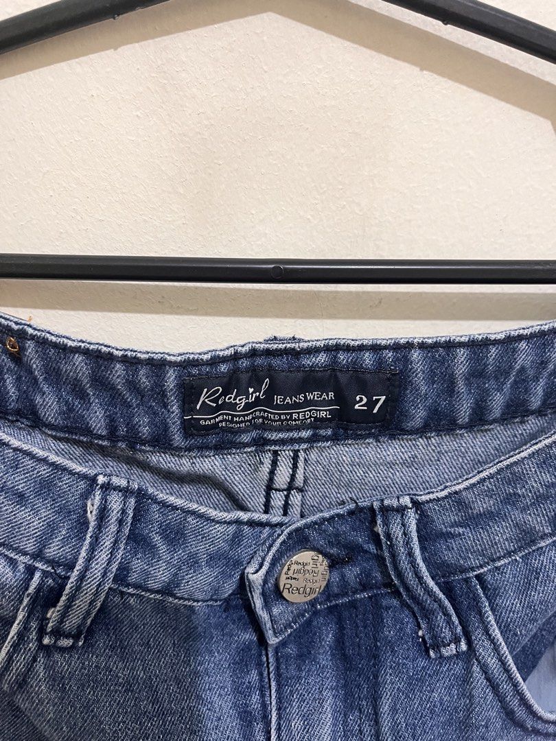 Redgirl Denim Cargo Skirt (Category: Skirts) located in Pasig City. Submitted by marjorieinumerable (Listing ID 1433465628, Image 3). Description: - Redgirl denim cargo skirt - Classic blue wash - Size 27 - Two front cargo pockets - Front slit - Button and zipper closure - Leather patch at the back - Perfect for casual wear.