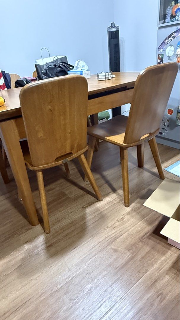 Solid wood extendable table (Category: Tables & Sets) located in Singapore. Submitted by melcrazychan (Listing ID 1433507196, Image 3). Description: Solid wood table and chairs, owned for almost 3 years. Rough Dimensions: ~130cm (before extending) ~162cm (after extending) W ~80cm H ~76cm There are visible scratches and indents from regular use. I’m not sure how you can dismantle since there is the mechanism underneath to extend. Originally bought