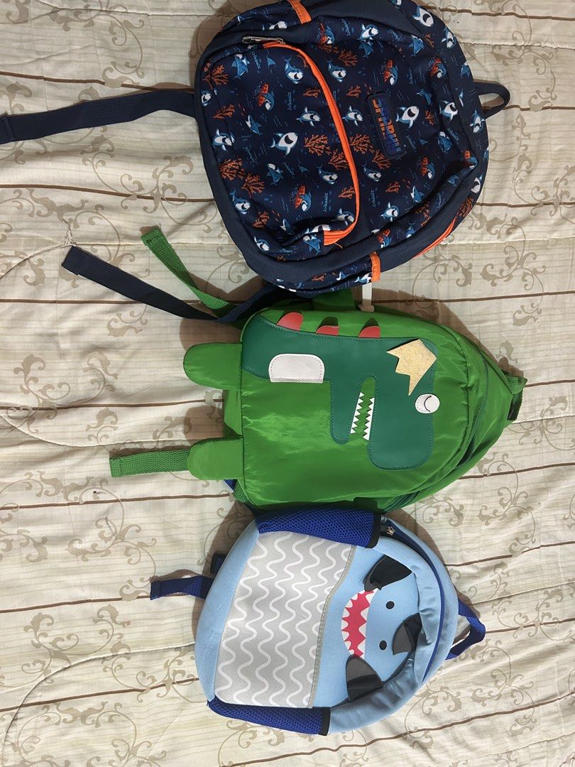 Sparky Shark, Dinosaur, and Fish Backpacks (Category: Backpacks) located in Taguig. Submitted by shepai (Listing ID 1433579393, Image 1). Description: Small backpack 3 for 500.