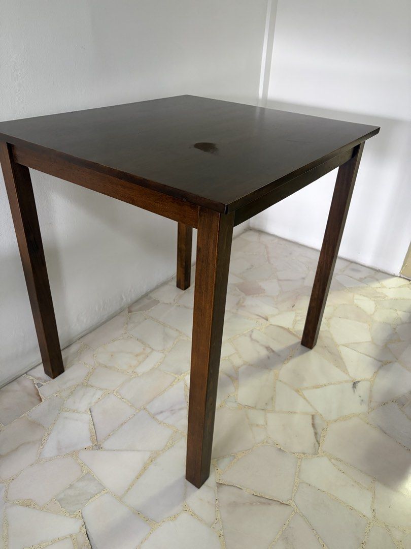 Square Dining Table with 4 Stools (Category: Tables & Sets) located in Singapore. Submitted by dhzlee (Listing ID 1433433521, Image 2). Description: - Dark brown square bar table - Includes four stools - Still in good condition Slight nego for serious buyer Self collect Yishun.