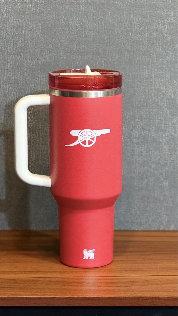 Stanley Arsenal Tumbler with Handle (Category: Water Bottles & Tumblers) located in Quezon City. Submitted by shejyy (Listing ID 1433422397, Image 2). Description: - Red Stanley tumbler with white handle - Features Arsenal and Stanley logos - Includes a lid - Keeps drinks cold or hot - Original price tag visible -limited edition -Arsenal collection -Guaranteed Original #arsenalcollection #arsenal #tumbler #limitededition.