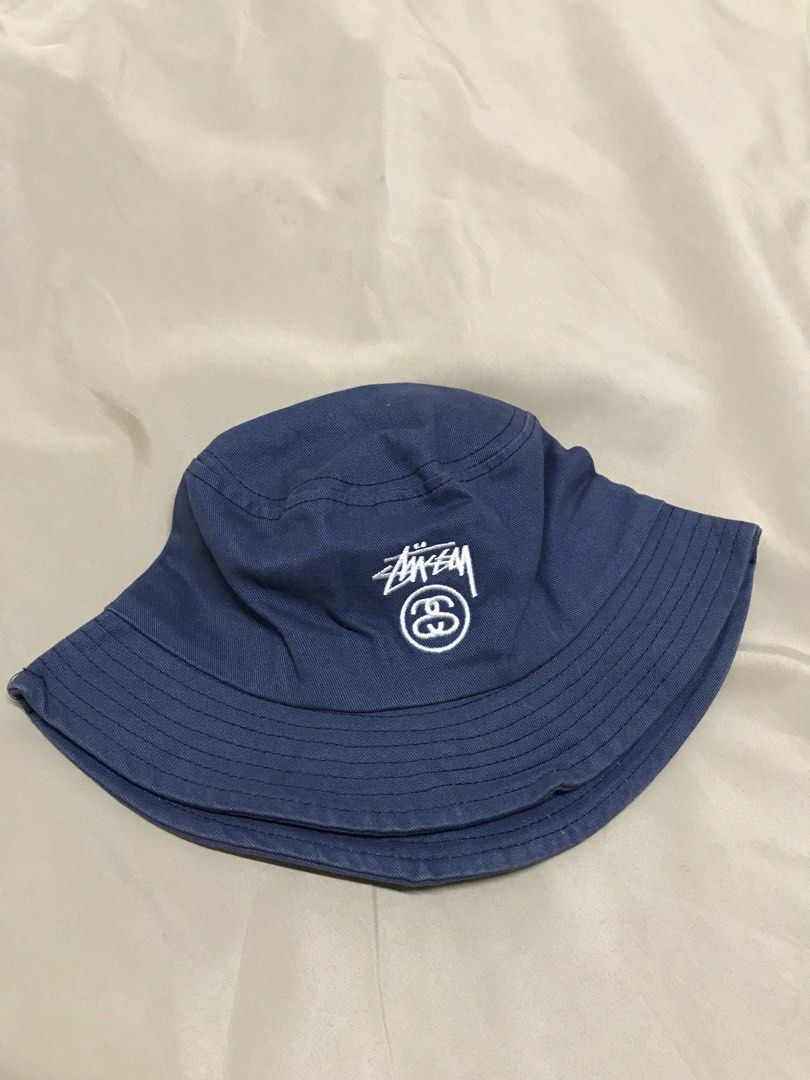 STUSSY BUCKET HAT COTTON (Category: Caps & Hats) located in Manila. Submitted by hatipid. (Listing ID 1433462304, Image 1). Description: STUSSY COTTON BLUE ADULT M-LARGE EXCELLENT CONDITION FOR ONLY:800php +SHIPPING FEE .