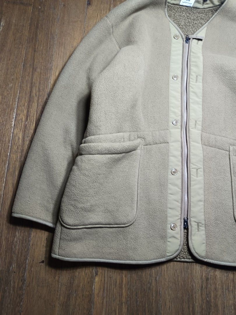 Uniqlo Engineered Garments Fleece Jacket XL (Category: Coats, Jackets and Outerwear) located in Mandaluyong City. Submitted by heatgear (Listing ID 1433540432, Image 2). Description: - Uniqlo x Engineered Garments fleece jacket - Size: XL mens - Features: Zip-up front with button details, two front pockets - Material: Soft, textured fleece - Color: Neutral - Condition: Good dimension L 23.5 w 27 s 24 1659 + sf location mandaluyong willing to meet