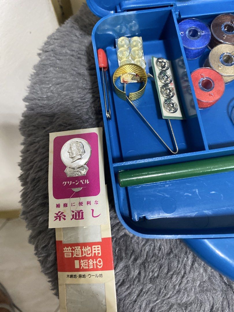 Vintage Sewing Kit with Accessories (Category: Craft Supplies & Tools) located in Marikina City. Submitted by myprelovedcollectibles (Listing ID 1433416459, Image 2). Description: - Vintage sewing kit - Blue plastic case - Includes: - Spools of thread (various colors) - Needles - Bobbins - Seam ripper - Measuring tape - Zipper - Needle threader - Pencil - Complete set for basic sewing needs..