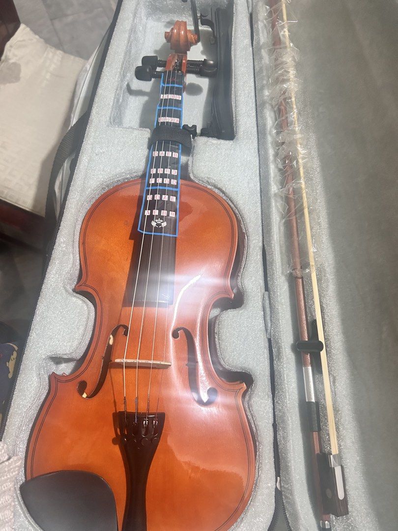 Violin with Accessories (Category: Musical Instruments) located in Manila. Submitted by infinitetsukoyomi (Listing ID 1433541565, Image 1). Description: - Violin with case, bow, rosin and tuner - Includes a set of good quality violin strings - "Easy Violin Method Book" by Joselito C. Alejandrino included - Violin stored in a case - Ready to play.