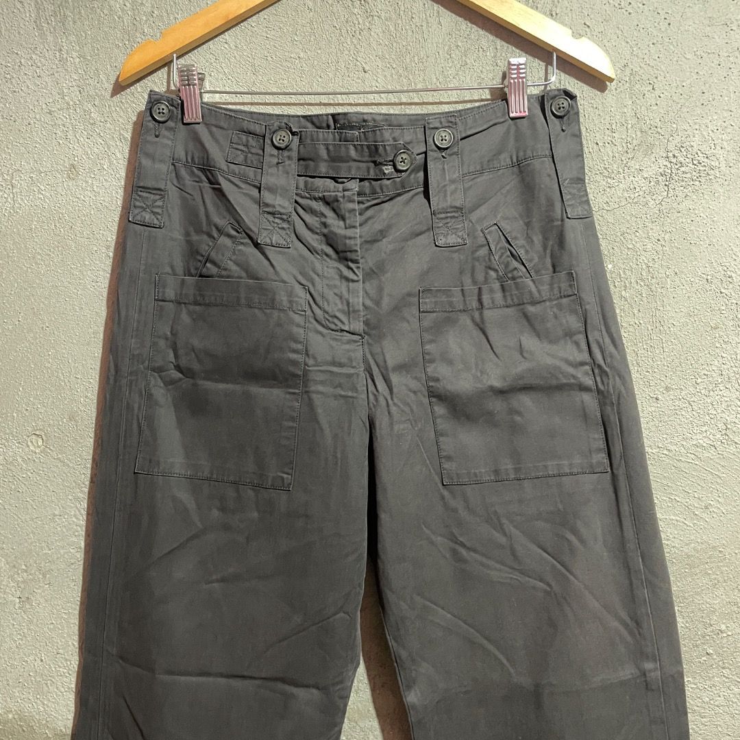 Vivienne Westwood Anglomania Multipocket Pants (Category: Jeans) located in Enrique B. Magalona (Saravia). Submitted by artisan.ph (Listing ID 1433561210, Image 3). Description: - Vivienne Westwood Anglomania pants - Dark grey color - Wide-leg design - Size 40 - Made in Italy - Multiple pockets - Unique button details with Vivienne Westwood logo - Tailored fit.