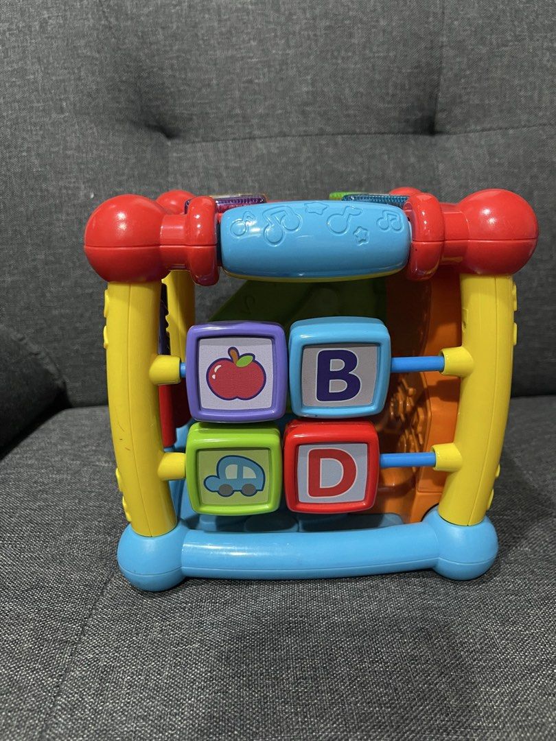 VTech Busy Learners Activity Cube (Category: Infant Playtime) located in Quezon City. Submitted by glezylda29.95 (Listing ID 1433452478, Image 2). Description: - VTech Busy Learners Activity Cube: A fun and engaging toy for toddlers! - Features multiple interactive sides. - Includes shape sorters, bead mazes, and musical elements. - Bright colors and playful designs to stimulate senses. - Helps develop fine motor skills and cognitive abilities..