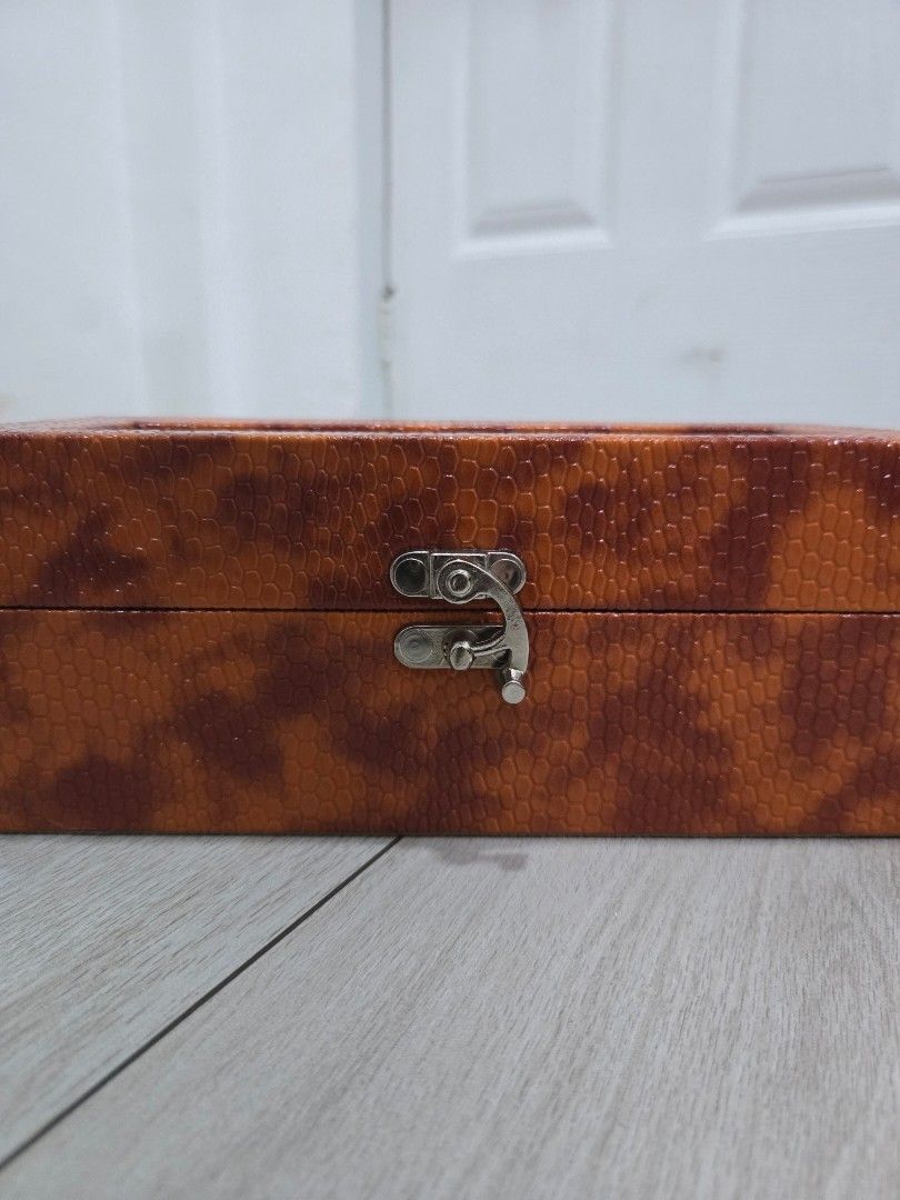 Watch Display Box - Orange (Category: Women's Watches) located in Manila. Submitted by aynatpc (Listing ID 1433522495, Image 2). Description: - Orange, textured exterior - Clear viewing window - Multiple compartments for watches - Soft interior lining - Secure metal clasp Seiko not included.