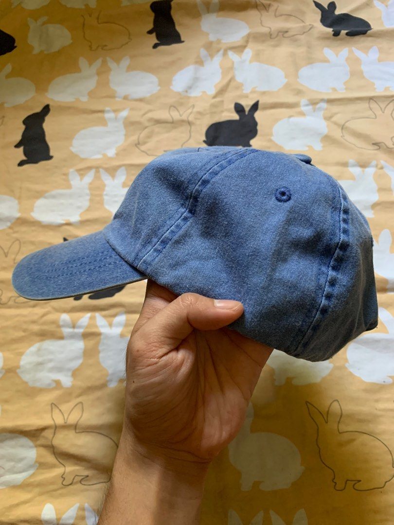 Y2K Bite Me statement strapback dad cap (Category: Caps & Hats) located in Cagayan de Oro. Submitted by premium_thrifts (Listing ID 1433503331, Image 2). Description: Good condition. Embroidered Denim blue colorway OSFA Issue: spot stain Add shipping fee (via JRS or J&T).