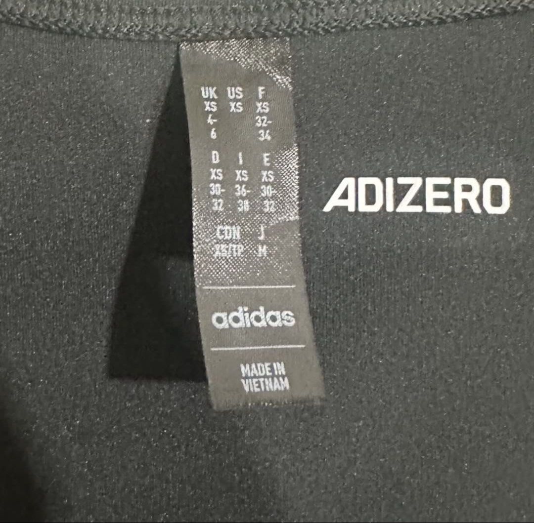 Adidas Adizero Crop top (Category: Activewear) located in Cebu City. Submitted by 012goodiegoodie (Listing ID 1433470002, Image 2). Description: - Adidas Adizero crop workout top - Color: Black - XS size in UK, US, and F sizes - Measurements in centimeters on tag - RFS: too small for me.