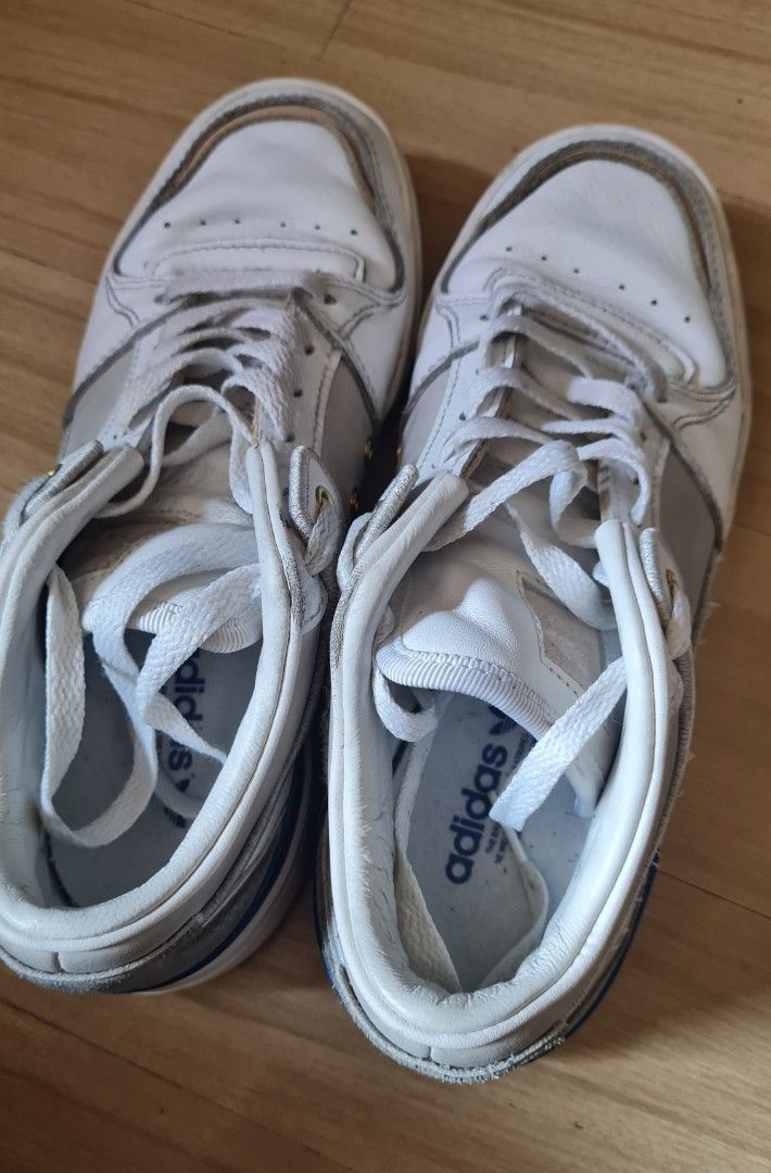Adidas Forum Low White Sneakers (Category: Babies & Kids Fashion) located in Pasig City. Submitted by rakel10 (Listing ID 1433649025, Image 1). Description: - Adidas Forum Low sneakers - White with grey and blue accents - US size 4.5, UK 4, JP 225 - Adidas logo on tongue and insole - Signs of wear on upper and sole - Stored in the cabinet, so it may need a little cleaning before use. -Please manage your expectations, as this is a pre-loved item a