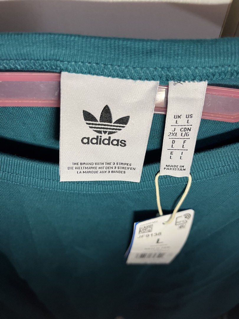 Adidas Neu C Tee - Green - L with Tag (Category: Tshirts & Polo Shirts ) located in Manila. Submitted by sweeterpotato77 (Listing ID 1433740601, Image 3). Description: - Authentic Adidas Neu C Tee - Color: Teal Green - Size: L - Adidas trefoil logo - Brand new with original tags - Original price: $35.