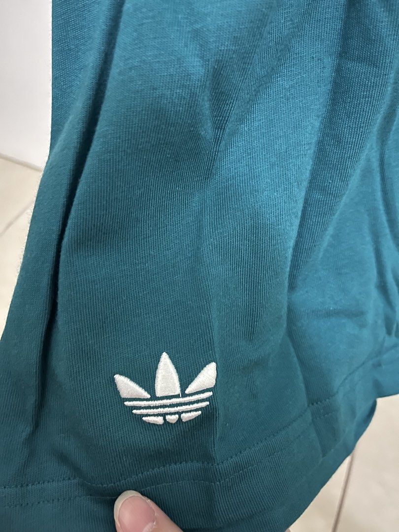 Adidas Neu C Tee - Green - L with Tag (Category: Tshirts & Polo Shirts ) located in Manila. Submitted by sweeterpotato77 (Listing ID 1433740601, Image 2). Description: - Authentic Adidas Neu C Tee - Color: Teal Green - Size: L - Adidas trefoil logo - Brand new with original tags - Original price: $35.
