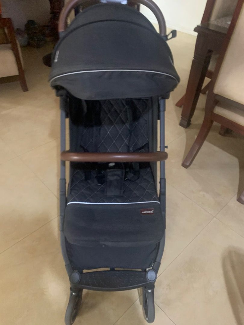 Akeeva Pollux Plus Stroller (Category: Strollers) located in Angeles City. Submitted by prelovedtrolleydoll (Listing ID 1433680629, Image 3). Description: - Akeena Pollux Plus stroller - Color: Black - Features: - Sunshade - Comfortable quilted seat - Brown handle - Storage basket included - Compact folding design - Gray wheels, black frame.