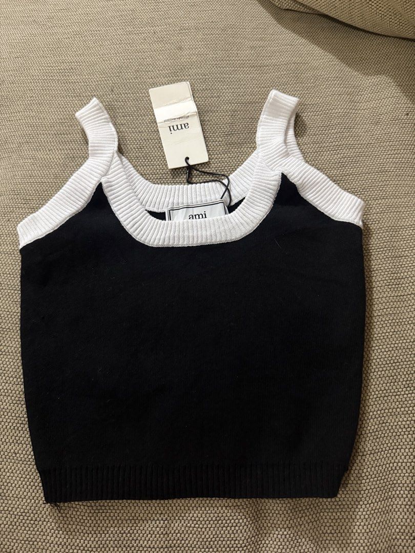 AMI Paris Black and White Tank Top (Category: Luxury Apparel) located in Sorsogon. Submitted by lunaticbaby (Listing ID 1433719197, Image 1). Description: - AMI Paris tank top - Black with white trim - Round neckline, spaghetti straps - Size: L on tag but can fit to semi large only - Made in Portugal .