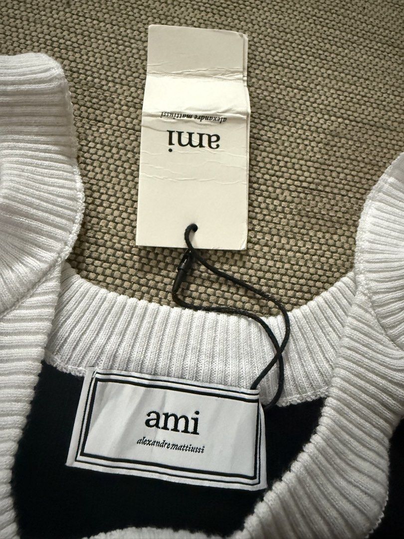 AMI Paris Black and White Tank Top (Category: Luxury Apparel) located in Sorsogon. Submitted by lunaticbaby (Listing ID 1433719197, Image 2). Description: - AMI Paris tank top - Black with white trim - Round neckline, spaghetti straps - Size: L on tag but can fit to semi large only - Made in Portugal .