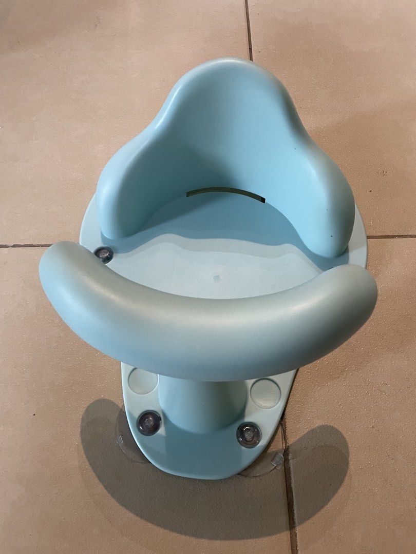 Baby Bath Seat - Blue (Category: Bathtub & Bath Accessories) located in Quezon City. Submitted by declutter-jen (Listing ID 1433713234, Image 3). Description: - Supports your baby during bath time - Curved seat and supportive backrest - Secure placement with suction cups - Light blue color - can be considered as brand new! - used only once cause baby does not prefer it.