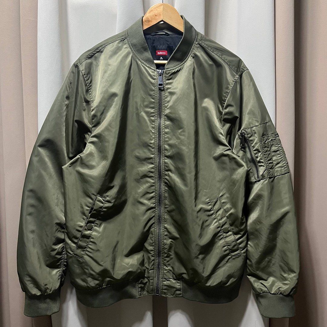 BALENO Bomber Jacket (Olive Green) (Category: Coats, Jackets and Outerwear) located in Bulacan. Submitted by ishrm (Listing ID 1433781509, Image 1). Description: XL on Tag No issue L - 28in W - 22.5in Shoulders - 20.5in Sleeves - 27in description: -2 side pockets -2 inner pockets -sleeve pocket MOD: J&T MOP: GCash only (Payment first).